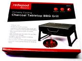 Portable folding charcoal bbq grill.
